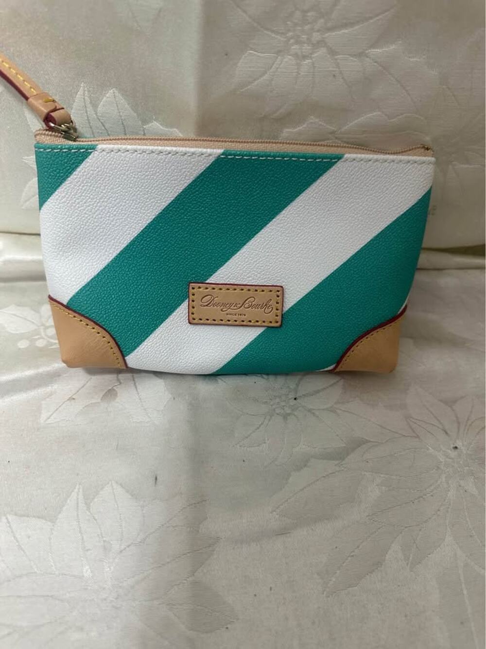 New Dooney & Bourke white and teal striped pouch. B-299